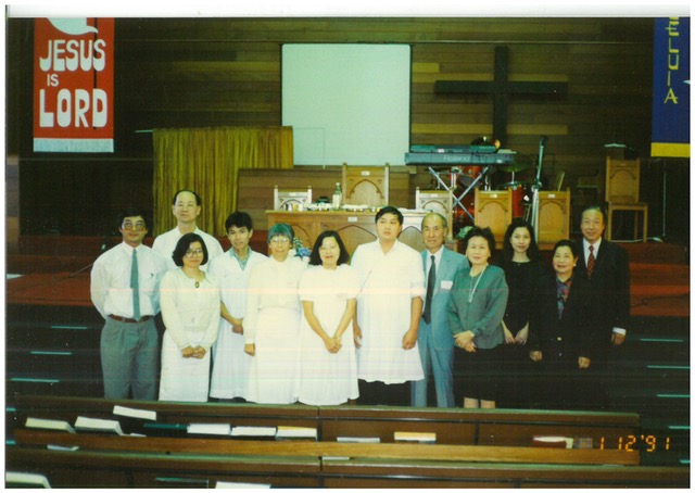 Early members of the Ling Liang Fellowship at a baptism service, December 1991