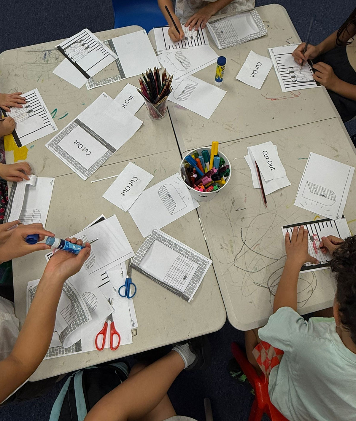 Children doing crafts at CrossWorms ministry
